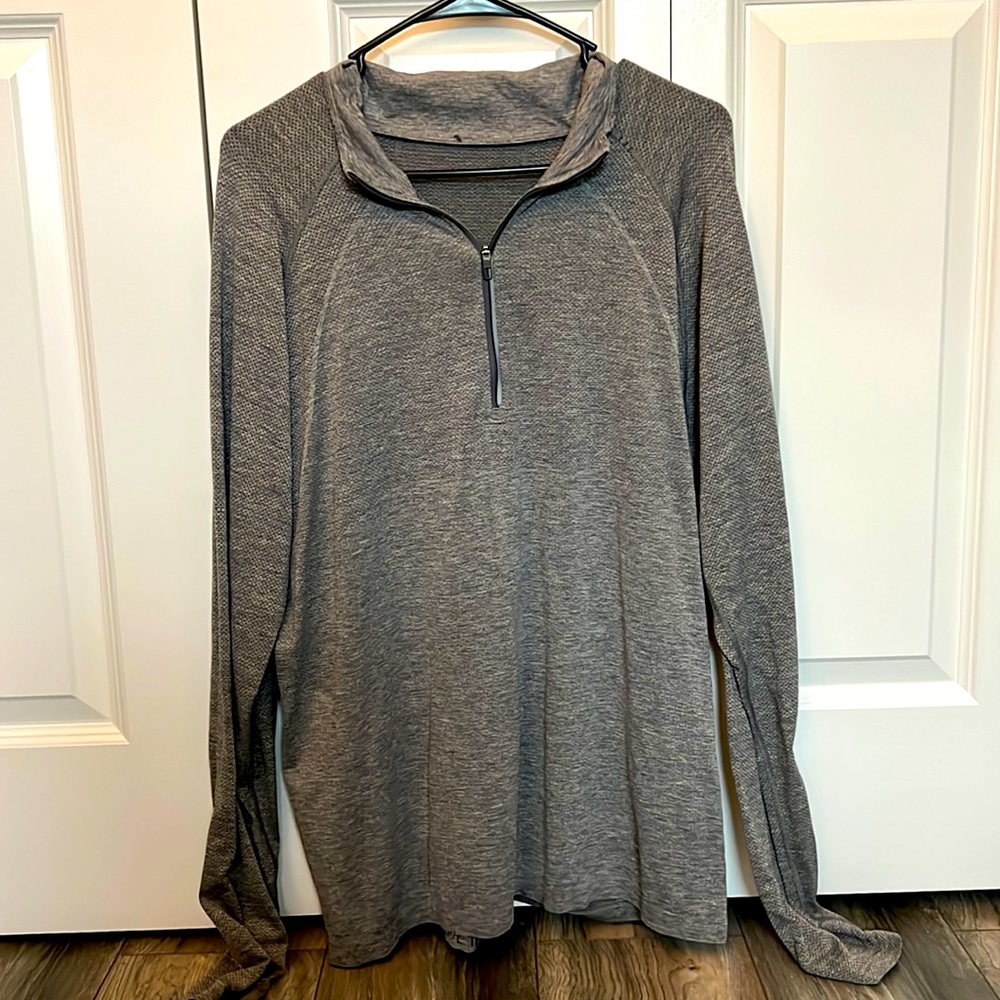 Men’s size Large quarter zip, Lululemon. Worn a few times, good condition.